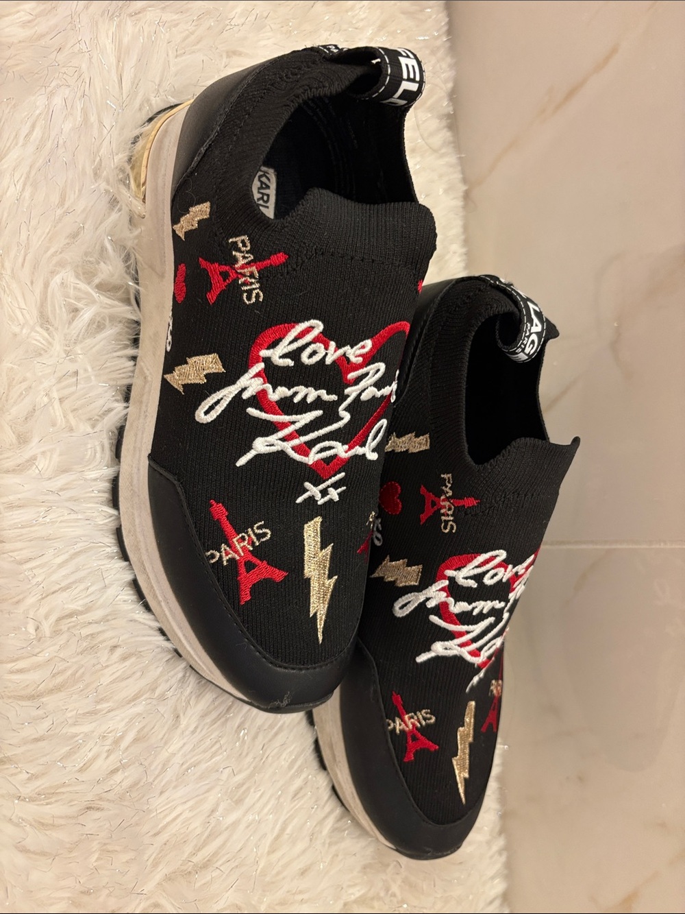 Embroidered Black Slip-On Sneakers with Red & Gold Accents